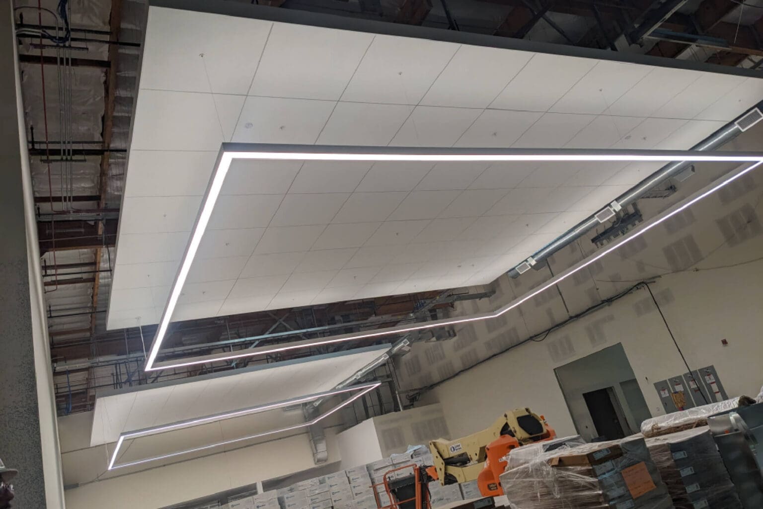 Suspended ceiling with modern lighting installation.